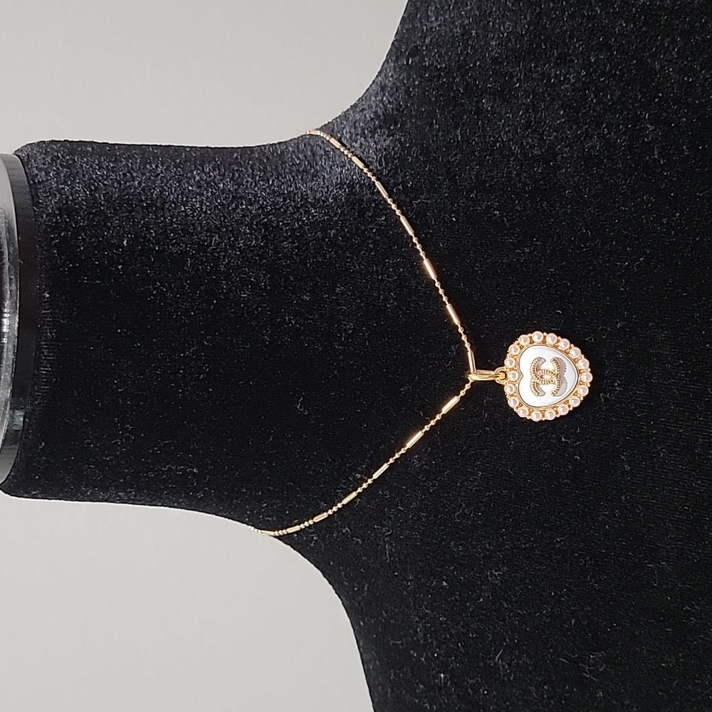 Luxury Charm with Pearls on Unbranded necklace